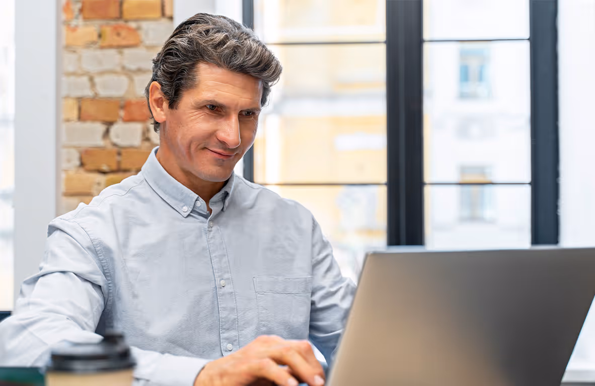 Professional using the full Binlogic platform on a laptop